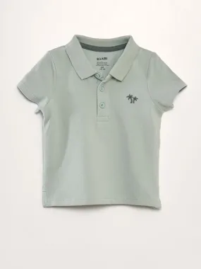 Polo de piqué de algodón 'palmeras' - VERDE
