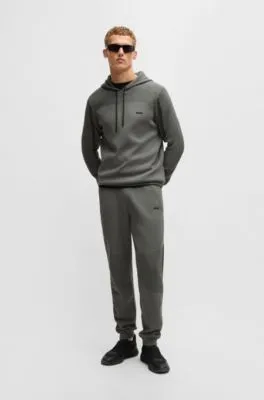 Sudadera de punto regular fit con capucha, rayas y detalles de la marca